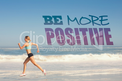 Composite image of fit woman jogging on the beach