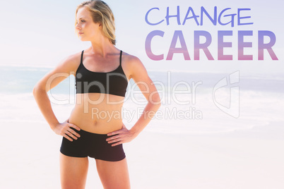 Composite image of fit blonde standing on the beach