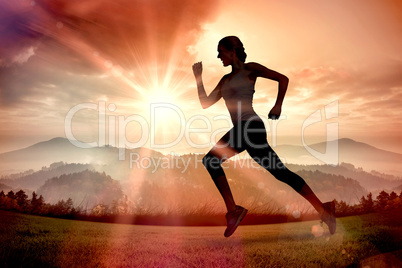 Composite image of pretty fit blonde jogging