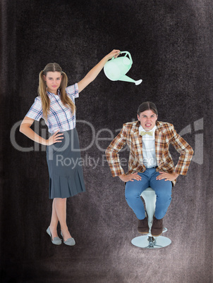 Composite image of geeky hipster watering her boyfriend