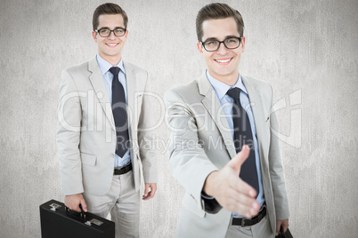 Composite image of businessman offering hand