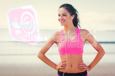 Composite image of beautiful smiling healthy with earphones on b