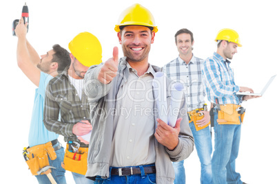 Composite image of architect showing thumbs up