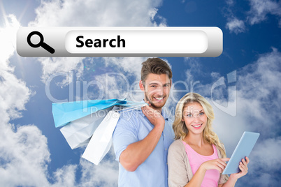 Composite image of attractive young couple holding shopping bags