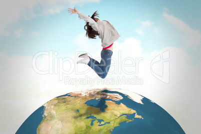 Composite image of cheerful young woman jumping