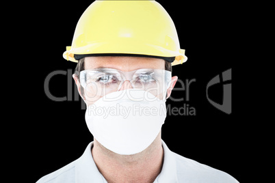 Composite image of worker wearing protective mask and glasses