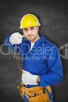 Composite image of confident repairman holding cables