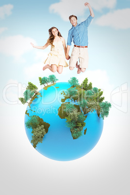 Composite image of cheerful young couple jumping