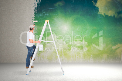 Composite image of handyman climbing ladder while using paint ro