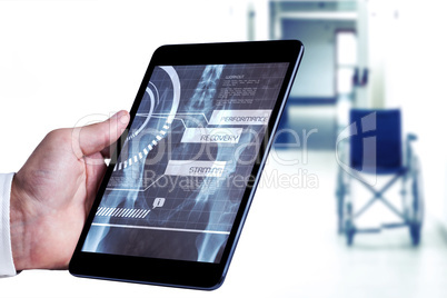 Composite image of man using tablet pc