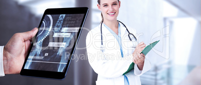 Composite image of man using tablet pc