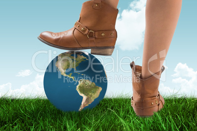 Composite image of cowboy boots dancing