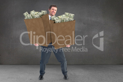 Composite image of businessman smiling with hands out