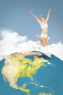 Composite image of gorgeous fit blonde jumping with arms out