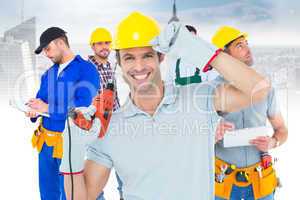 Composite image of handsome architect holding drill machine