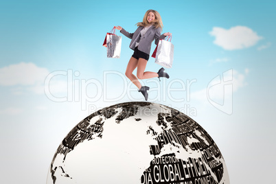 Composite image of stylish blonde jumping with shopping bags