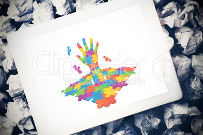 Composite image of autism awareness hand