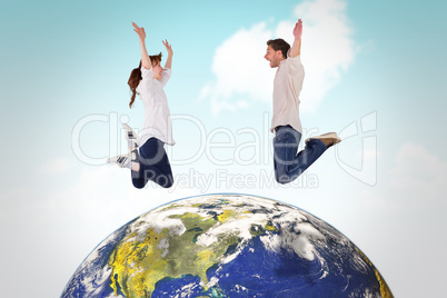 Composite image of couple jumping in the air