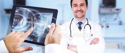 Composite image of man using tablet pc