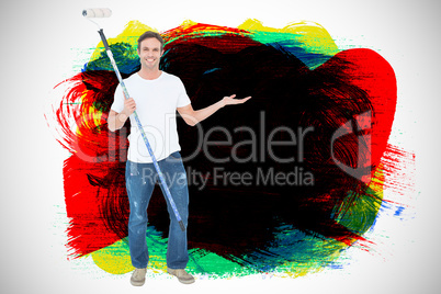 Composite image of man gesturing while holding paint roller Composite image of man gesturing while holding paint roller