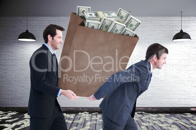 Composite image of businessmen carrying bag of dollars
