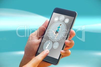 Composite image of hand holding smartphone