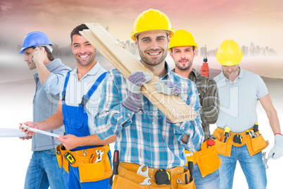 Composite image of construction worker carrying wooden planks