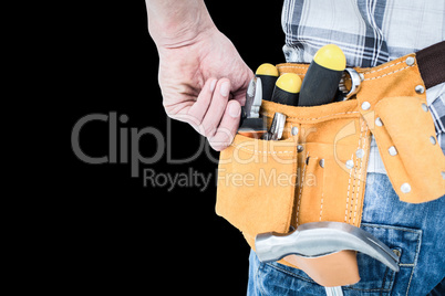 Composite image of technician with tool belt around waist