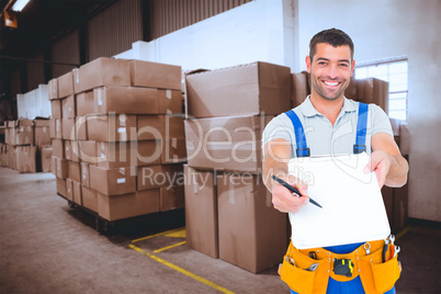 Composite image of smiling handyman giving clipboard for signatu