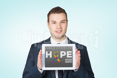 Composite image of businessman showing tablet pc screen