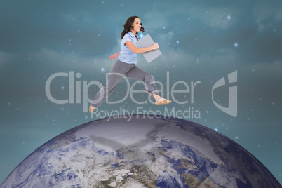 Composite image of cheerful classy businesswoman jumping while h