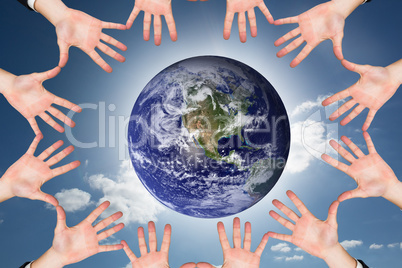 Composite image of circle of hands