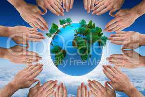 Composite image of circle of hands