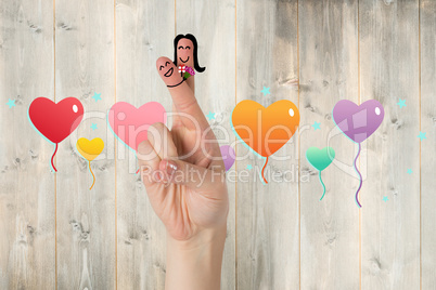 Composite image of fingers as a couple