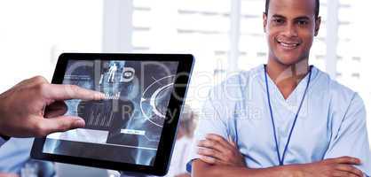 Composite image of man using tablet pc