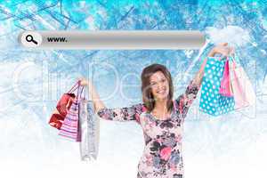 Composite image of woman standing with shopping bag