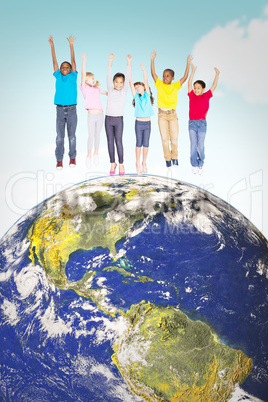 Composite image of elementary pupils jumping