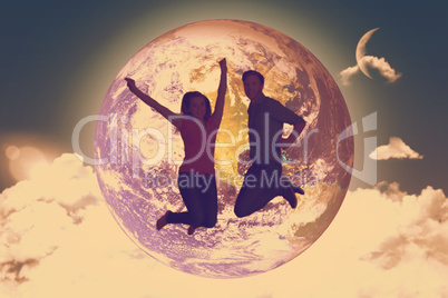 Composite image of cheerful young couple jumping