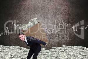 Composite image of businessman carrying bag of dollars