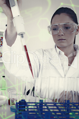 Composite image of gorgeous female biologist holding a manual pi