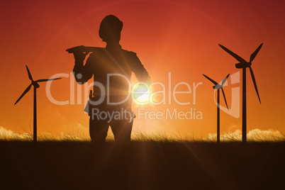 Composite image of thoughtful worker carrying wooden planks