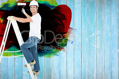 Composite image of portrait of man on ladder painting with roller