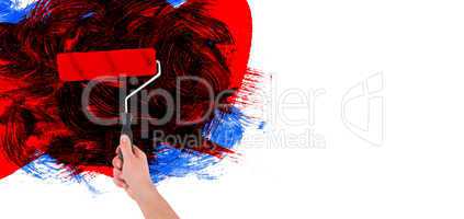 Composite image of handyman holding paint roller