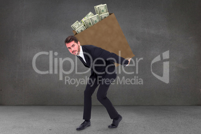 Composite image of businessman carrying something with his back