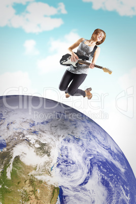 Composite image of pretty young girl playing her guitar