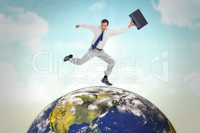 Composite image of cheerful jumping businessman with his suitcas