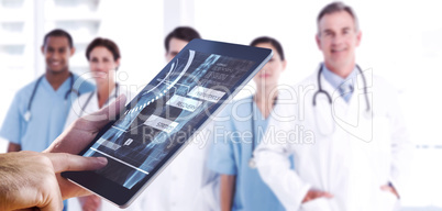 Composite image of man using tablet pc