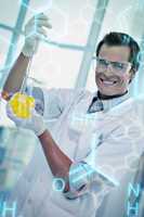 Composite image of young scientist working with a beaker