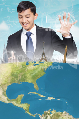 Composite image of smiling businessman holding and pointing