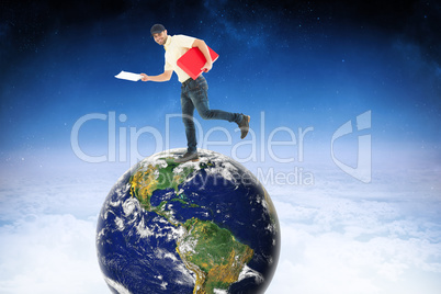 Composite image of delivery man with red box running on white ba